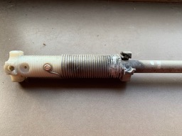 Bild:Fritzel Dipol Druchgebrannte Spule mit Stab.jpg